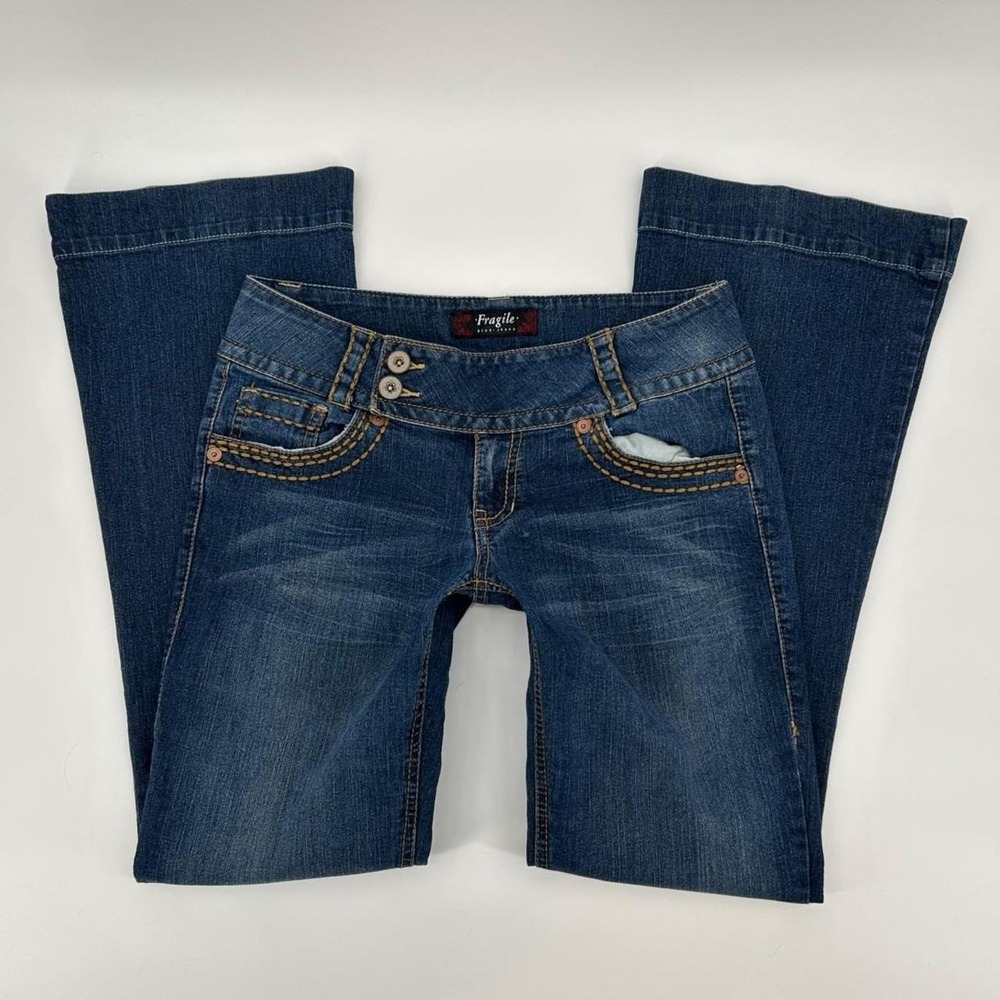 2000s Fragile low rise flare jeans with cute over strap for double button